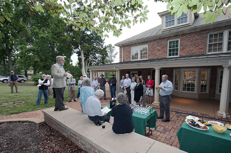 A group of people attending an event on Historic Sandusky's patio and courtyard
